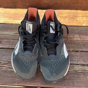 2 pairs of Reebok nanos